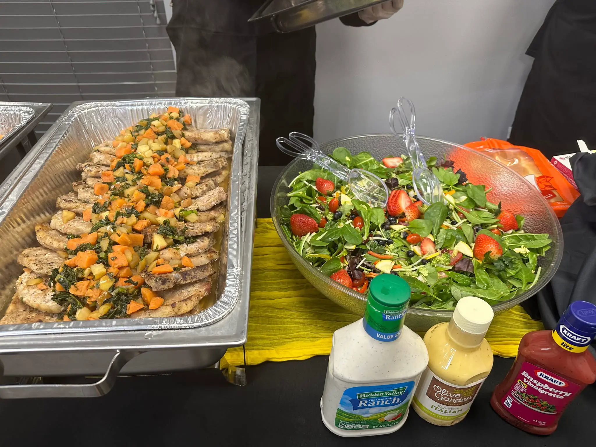 Catered spread at Prayer Board Party 2025